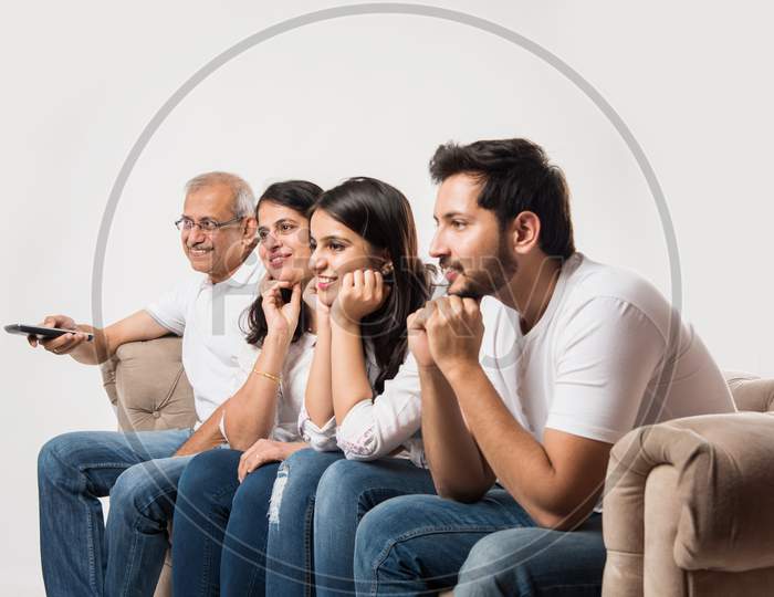 family watching TV at home