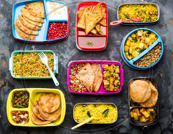 group of Lunch Box / Tiffin for Indian kids, showing variety or multiple option or combination of healthy food for your school g