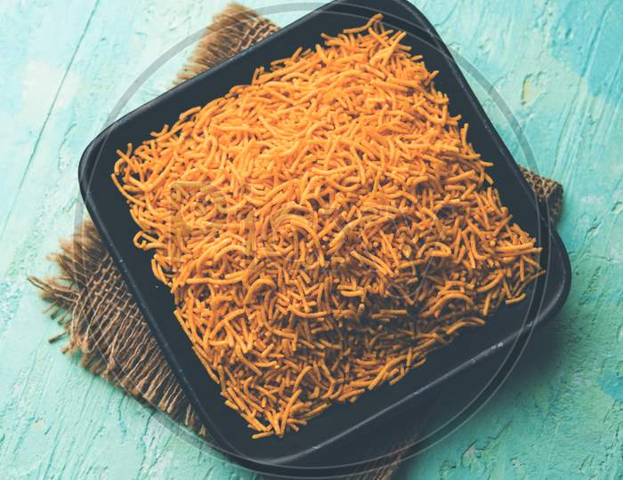 Aloo Bhujiya or Potato Bhujia also known as Namkeen sev. Popular Bikaneri recipe served in a bowl or plate. selective focus