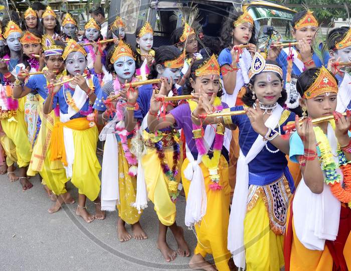 Children dress up as Lord Krishna on the occasion of Janmashtami festival