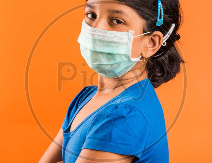 Small girl with medical health mask