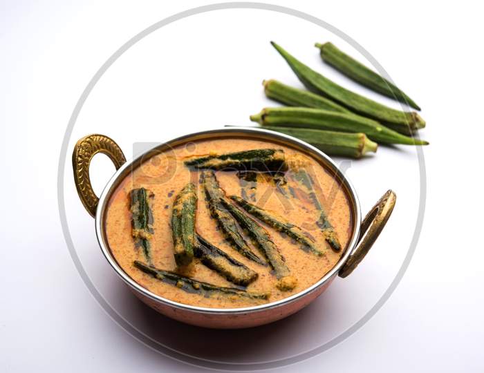 Hyderabadi Bhindi ka Salan or Okra salan made using ladies' fingers or ochro. Main course recipe from India. served in a bowl. s