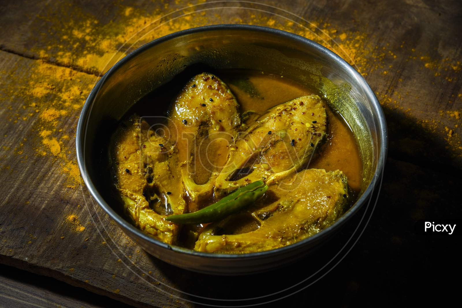 Ilish/ Hilsha cooked in mustard sauce. Bengali Ilish sorshe.