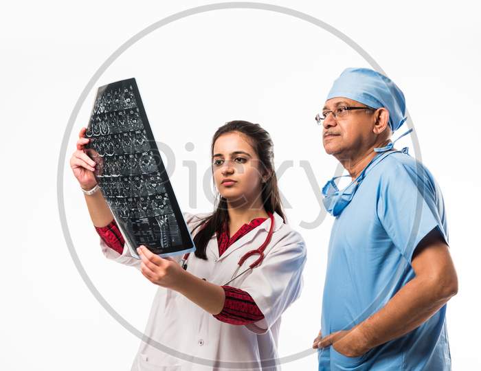 Doctors checking Xray / MRI report
