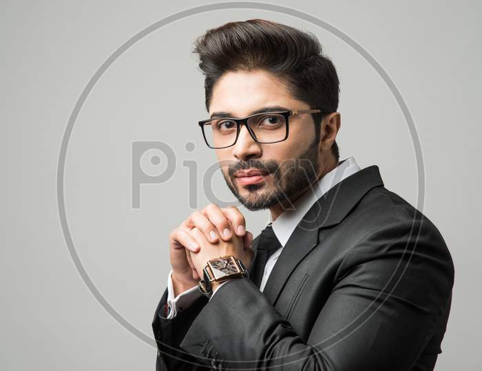 Indian businessman wears glasses or spectacles, bearded young businessman with eyewear