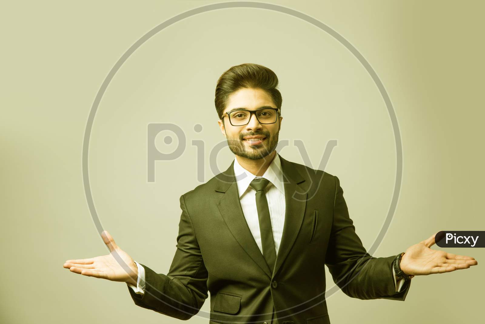 Image of spread both hands by Indian businessman, standing isolated with wide  open arms-GU351903-Picxy