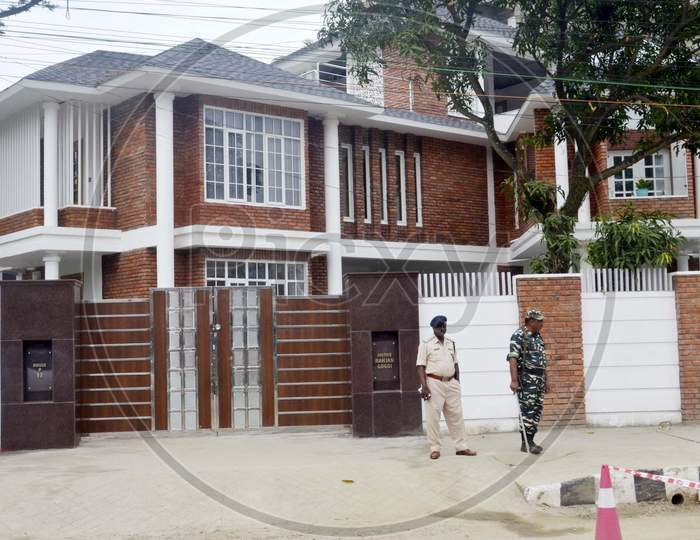 Security personnel stand guard in front of The residence of Chief Justice of India Ranjan Gogoi