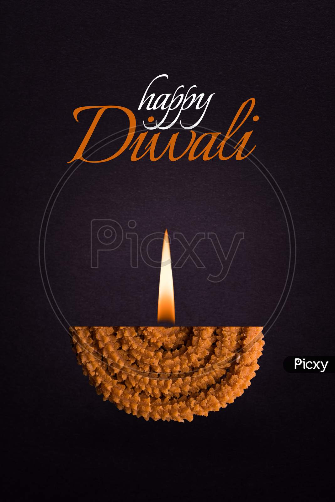 Happy Diwali Greeting card using Half Chakli as a diya with flame added to it