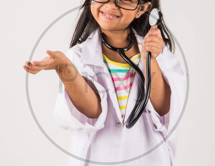 Small girl in doctor cloth with stethoscope