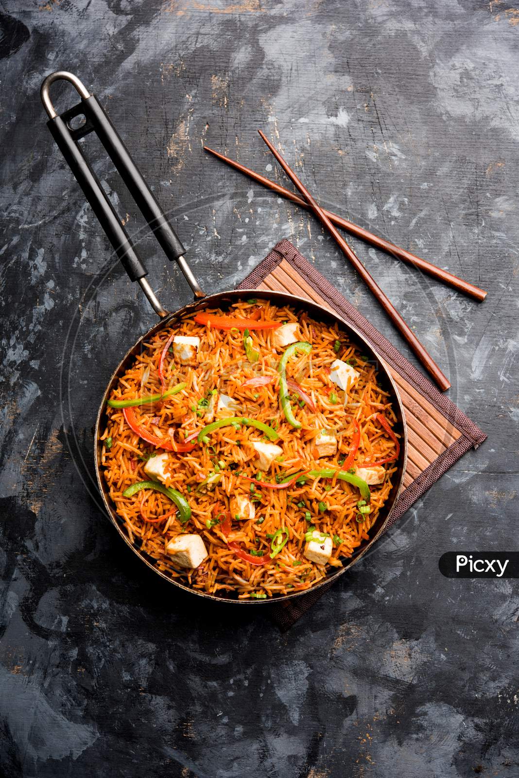 Image of Schezwan paneer fried rice with Szechuan sauce-YS464087-Picxy