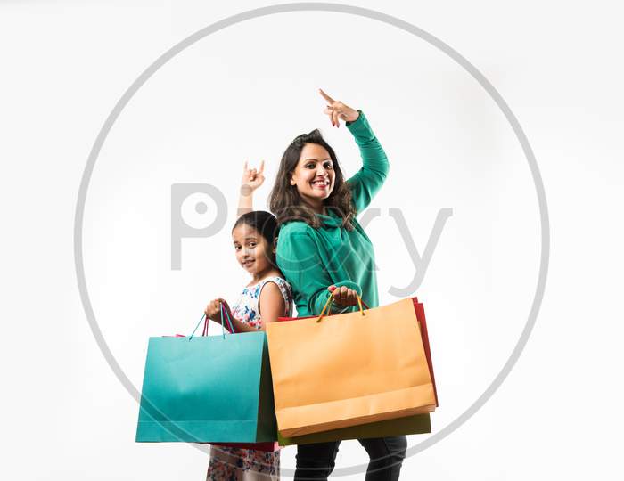 Mother Daughter with Shopping Bags