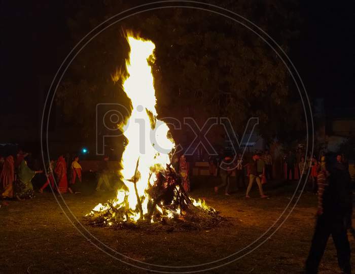 Photograph of giant bornfire lit on the occasion of holi or holika dahan or lohri.
