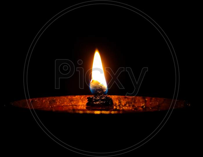 Diya or a candle inside a house