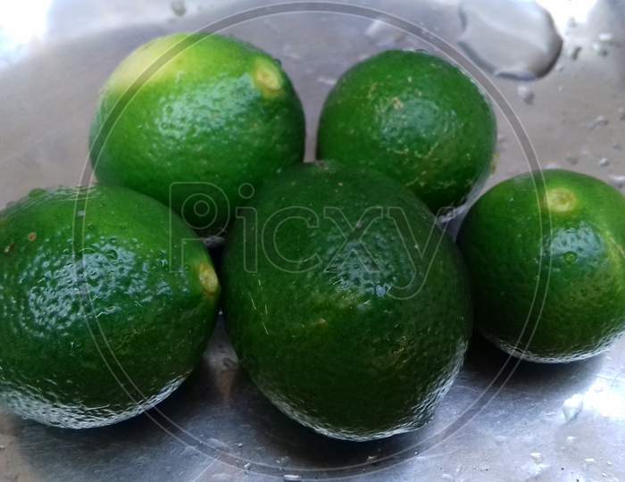 Green fresh lemons