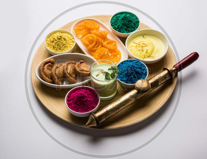 Happy Holi colours with Indian sweet food or dessert