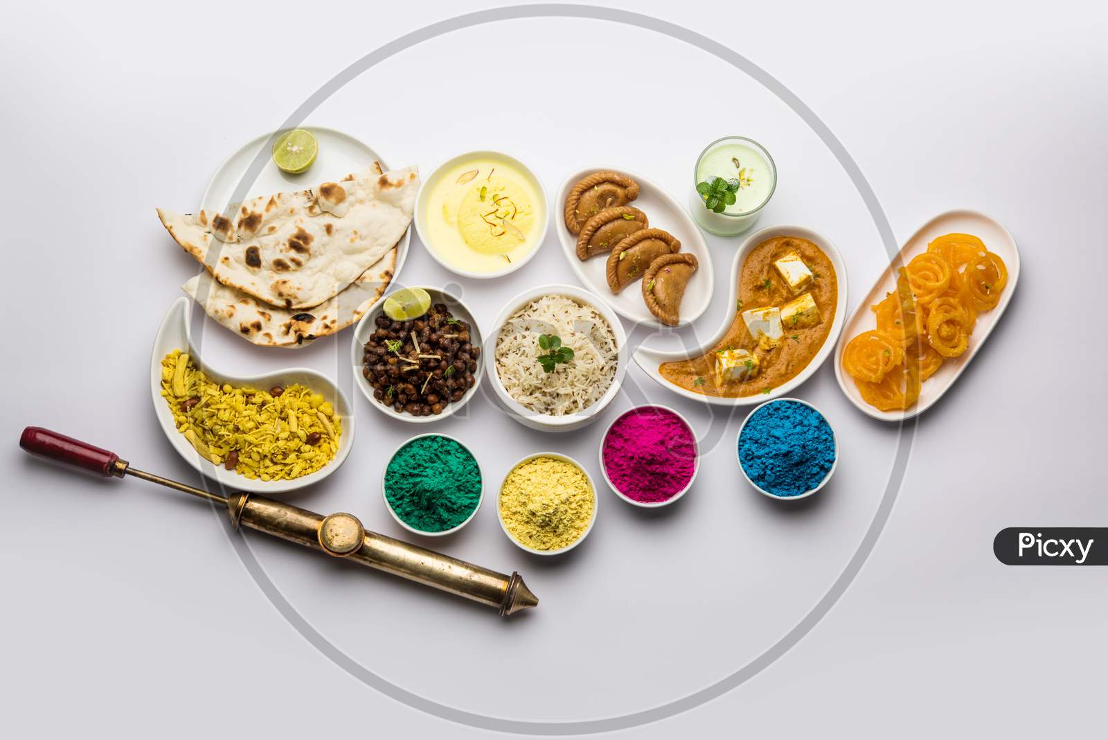 Happy Holi colours with Indian lunch food and sweet food or dessert