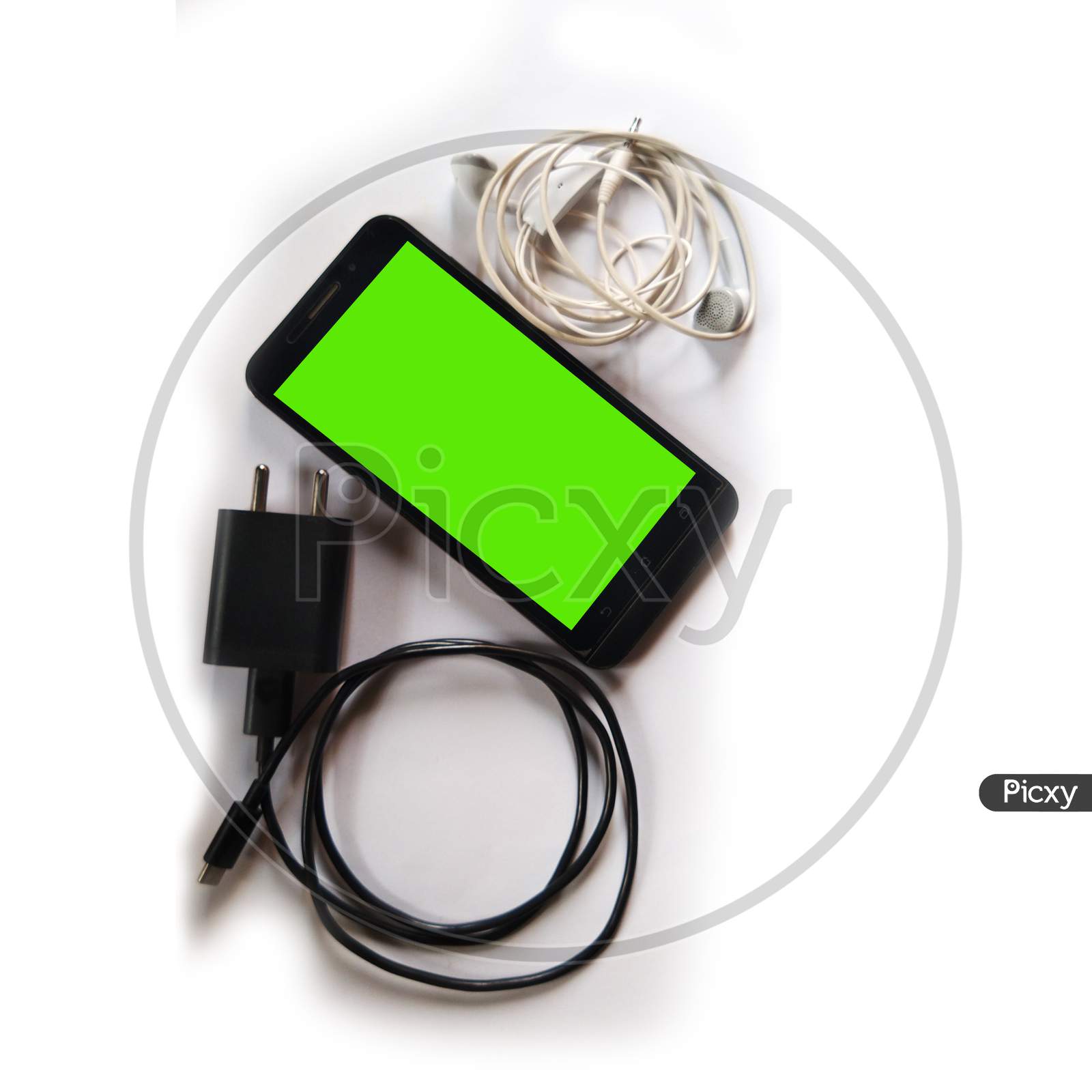 Green screen phone with charger and earphone