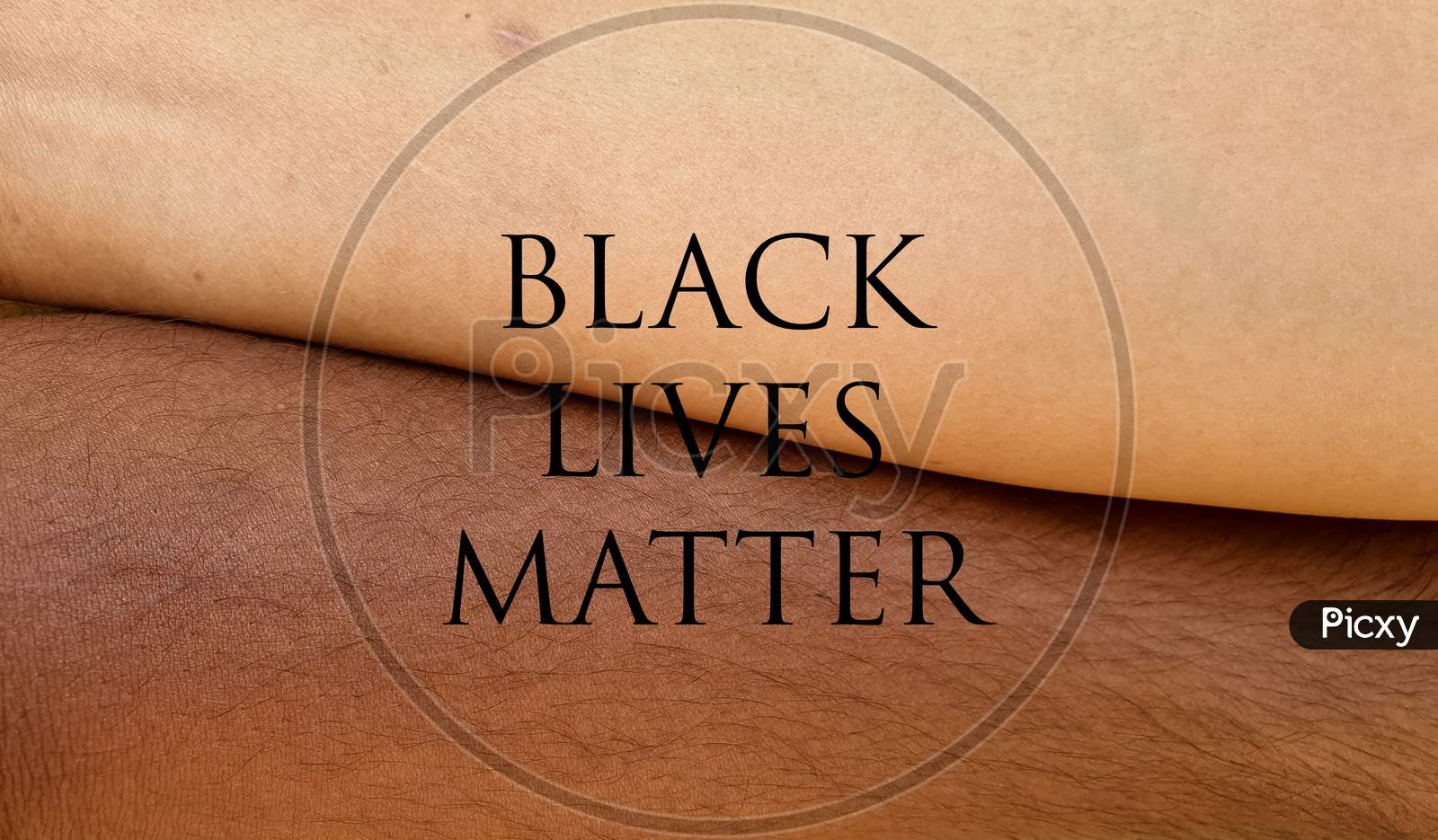 Black Lives Matter based stock photo of a black hand of a male and a fair hand of a female