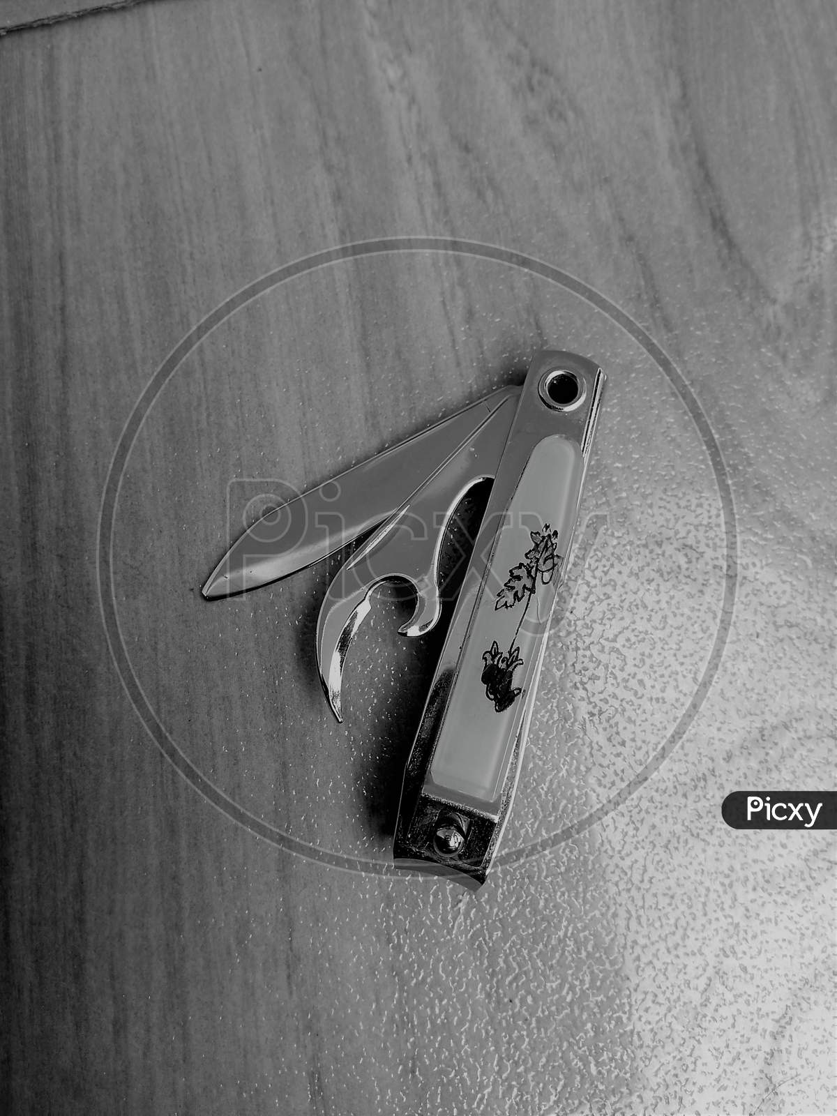 A nail clipper (also called nail clippers, a nail trimmer, a nail cutter or nipper type) is a hand tool used to trim fingernails, toenails and hangnails.