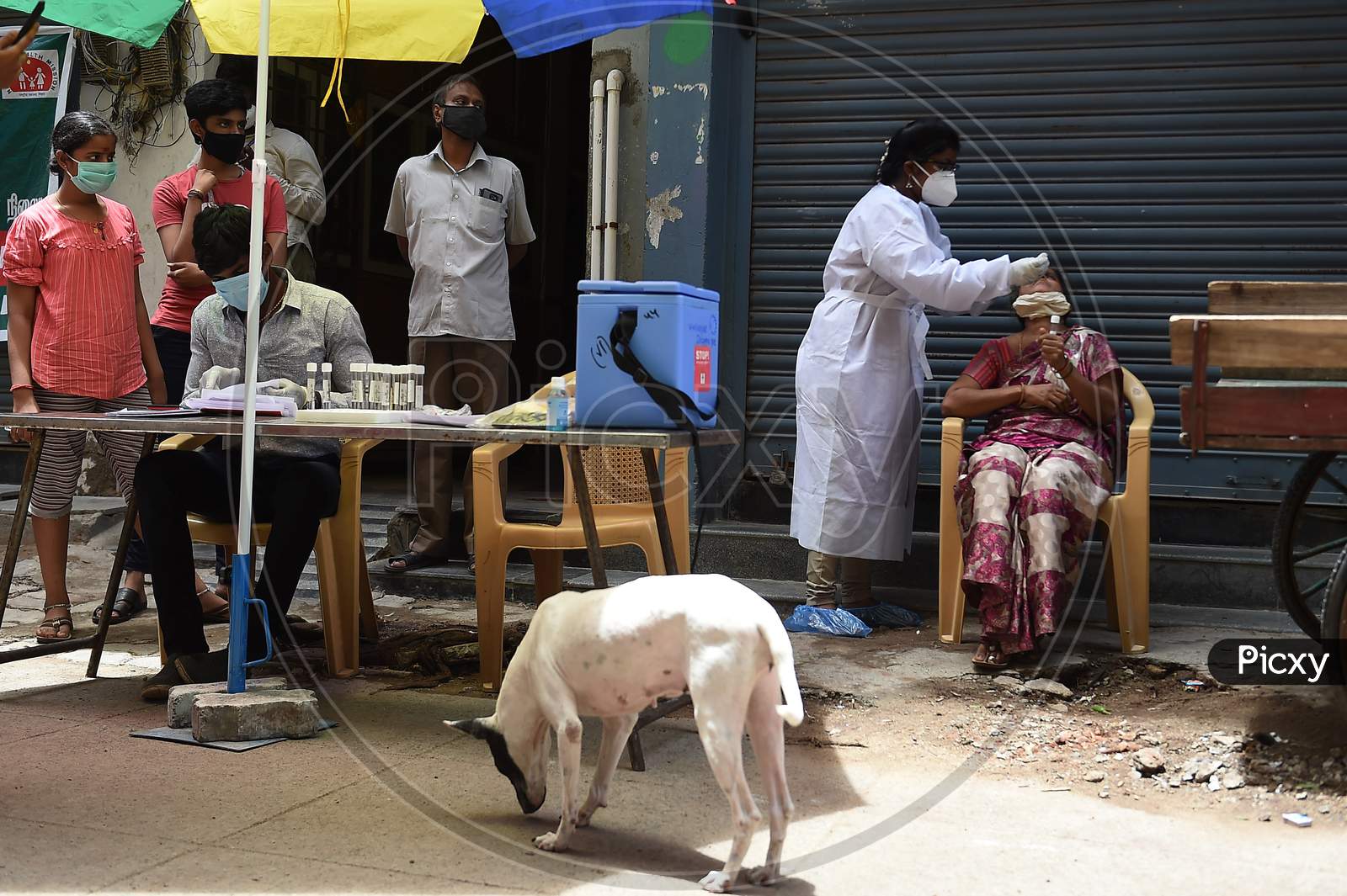A health worker collects swab samples for Covid-19 testing at a medical camp in Chennai on July 11, 2020