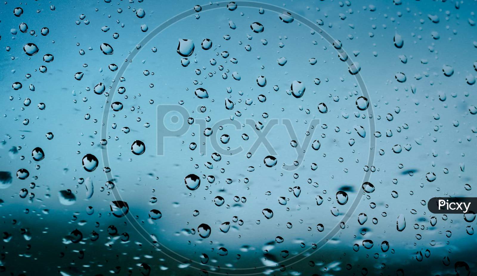 Rain drops on window glass