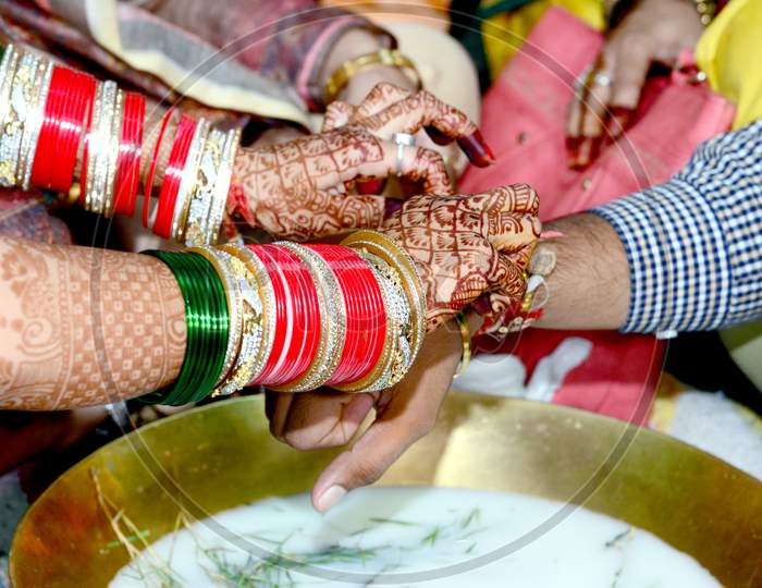 Indian Couple Playing Ring Fishing Game In Wedding Ceremony Of India