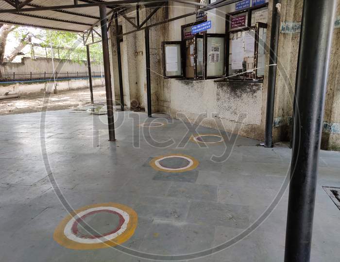 ROHINI, DELHI, INDIA.11 JULY 2020. Circle marked on ground for standing in queue with social distancing for people visit hospital registration counter during Corona virus spread.