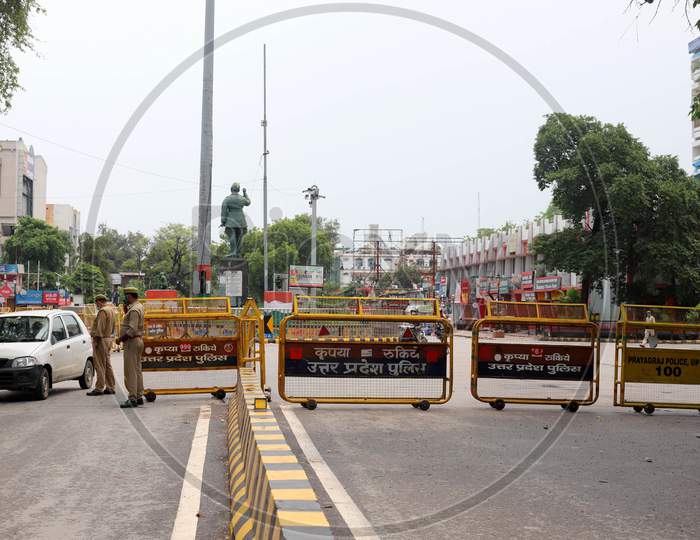 Police officials inspect vehicles during the lockdown in Prayagraj, Uttar Pradesh on July 12, 2020