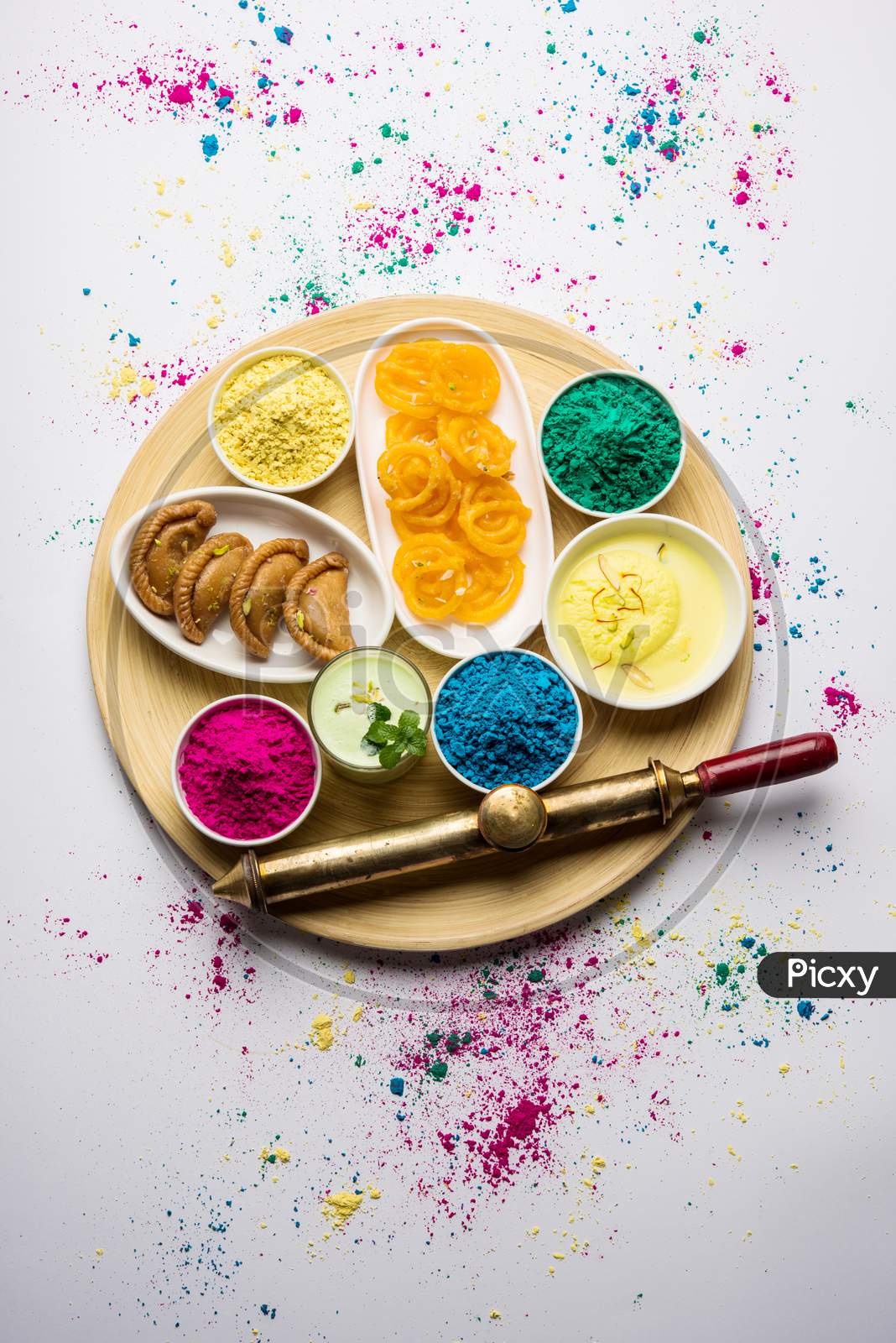 Happy Holi colours with Indian sweet food or dessert
