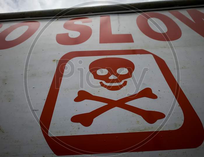 Danger symbol sign board. Warning sign. Red colour Skull sign board. Dangerous symbol sign board.