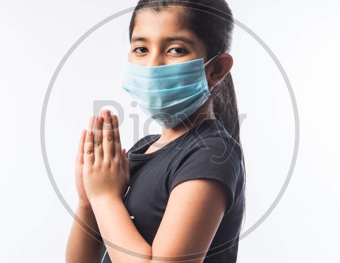 Indian Little Girl wearing Medical Face Mask