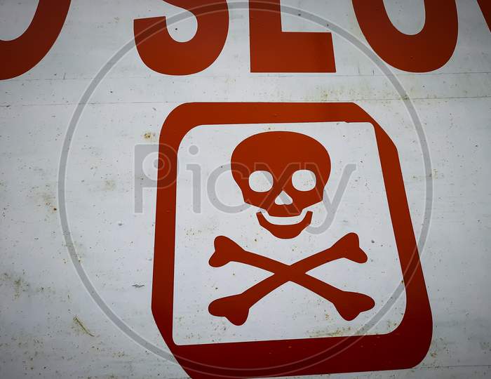 Danger symbol sign board. Warning sign. Red colour Skull sign board. Dangerous symbol sign board.