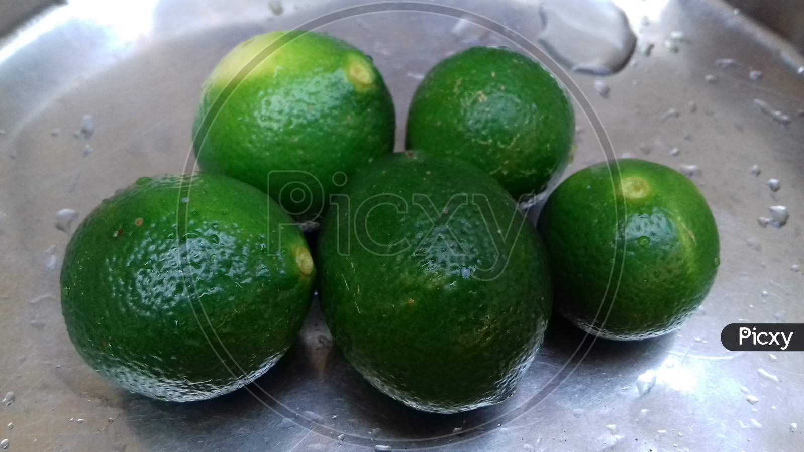 Green fresh lemons