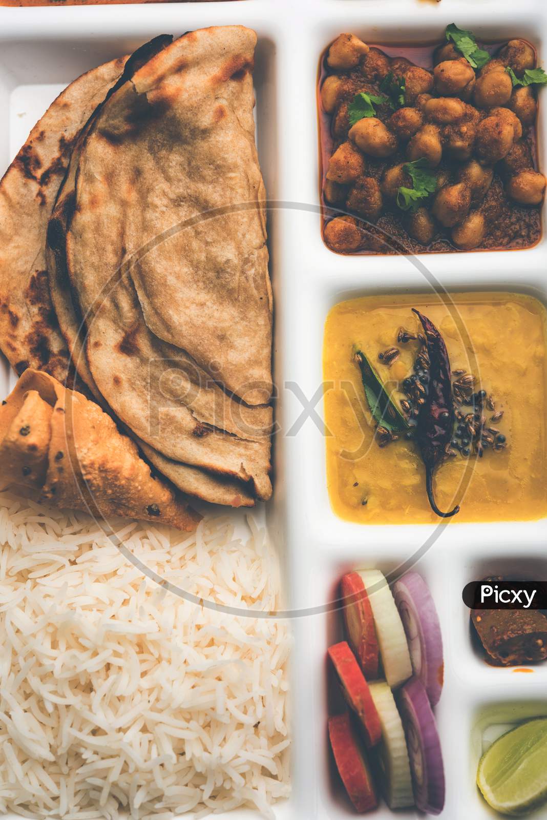Indian vegetarian Food Thali or Parcel food-tray