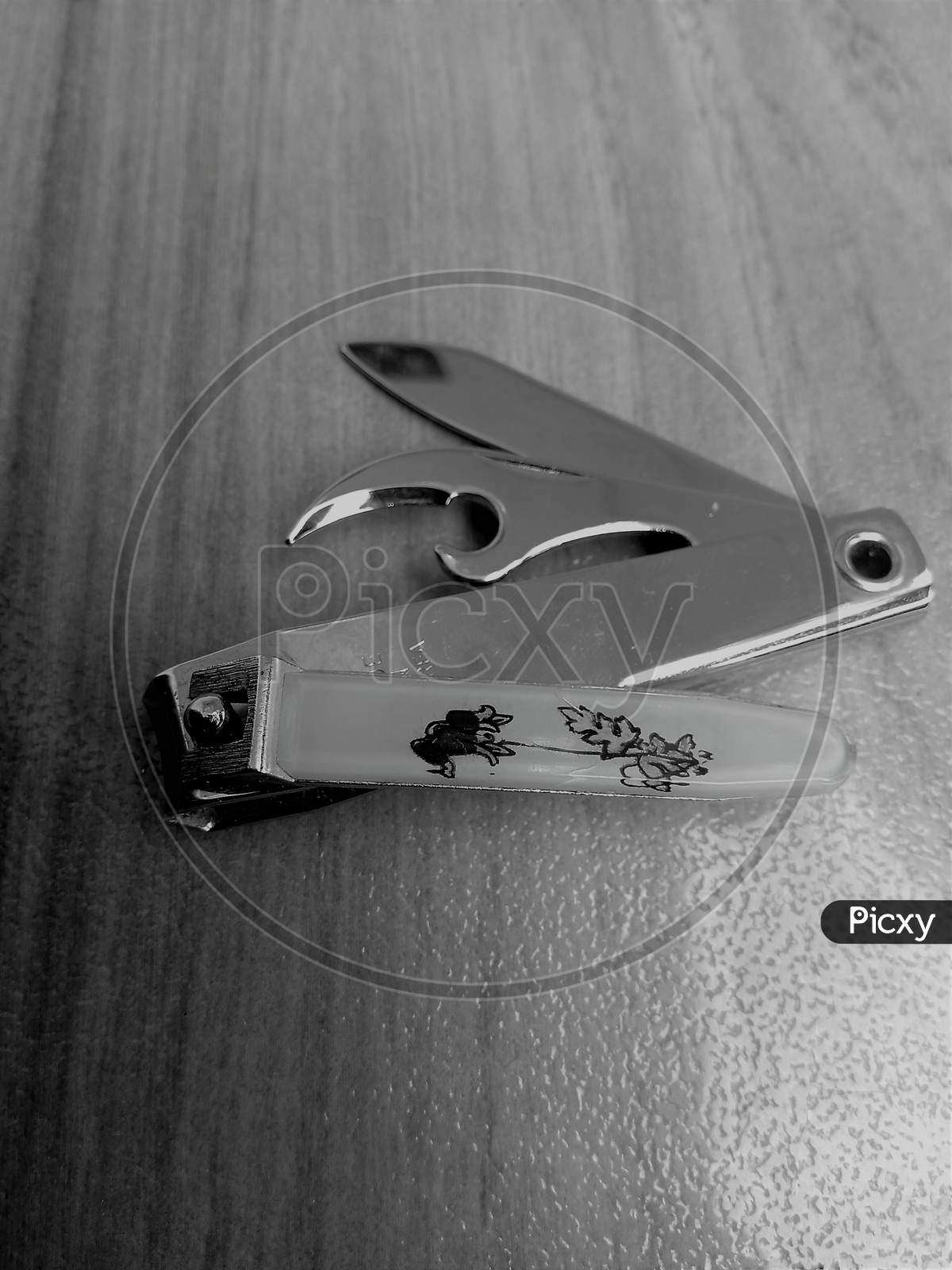 A nail clipper (also called nail clippers, a nail trimmer, a nail cutter or nipper type) is a hand tool used to trim fingernails, toenails and hangnails.