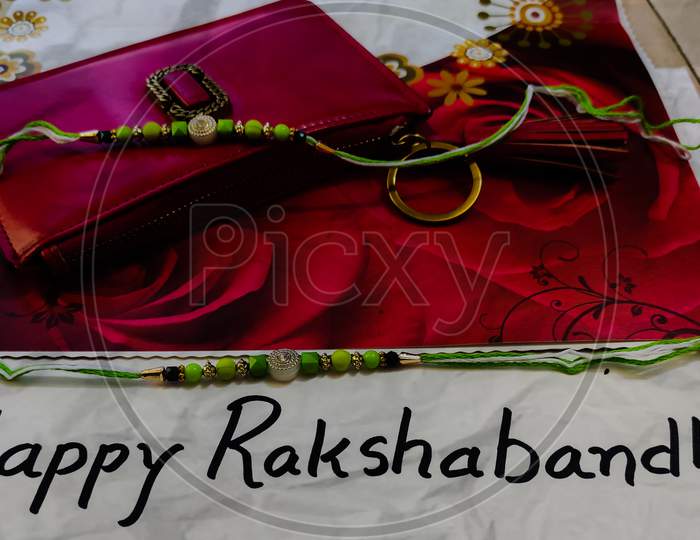 A card saying happy rakshabandhan, a festival of brother and sister love.