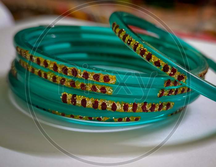 BANGLES a traditional ethnic must wear of every married indian lady ..