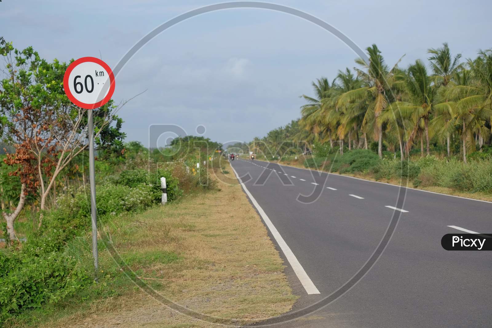 Asphalt roads and signs of limit speed to 60 km / hour