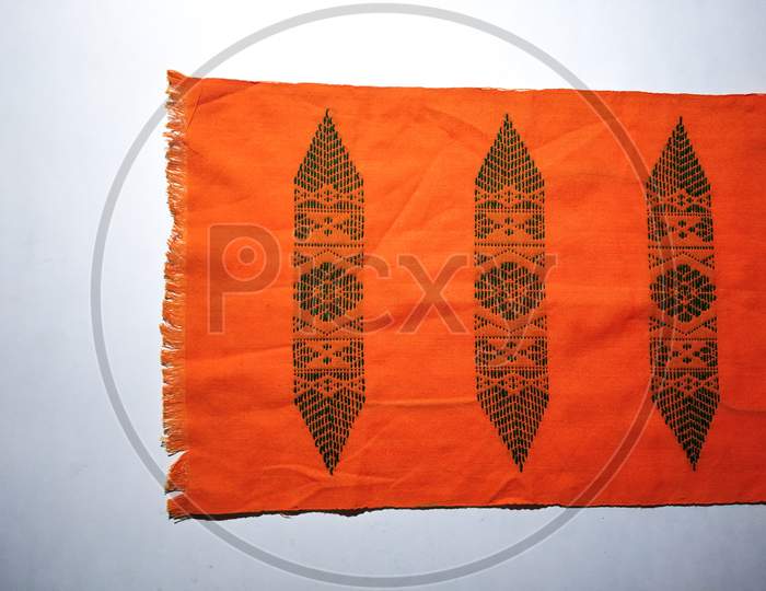 Aronai is a small Scarf, used both by Men and Women. Aronai is the sign of Boro tradition and is used to felicitate guests with honour, as a gift. In winter.