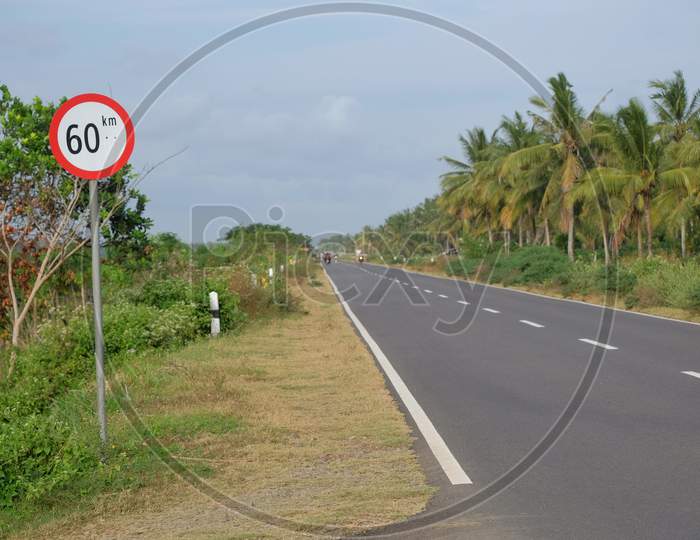 Asphalt roads and signs of limit speed to 60 km / hour