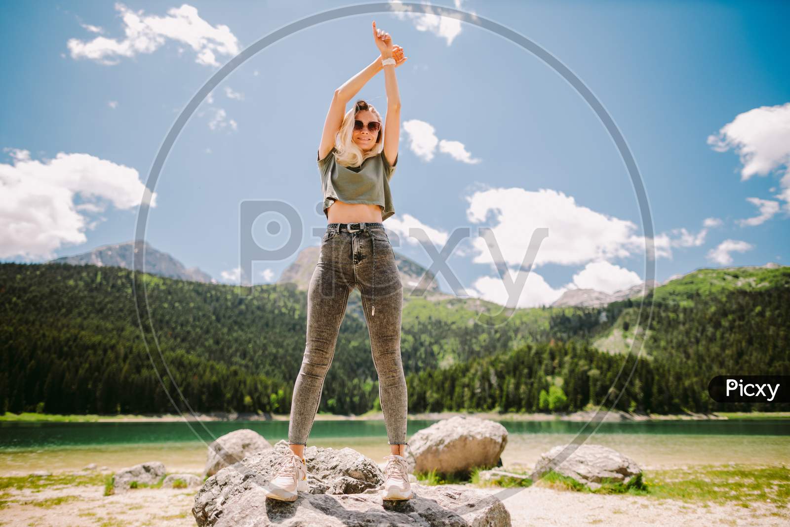 Attractive Woman Posing In Mountains