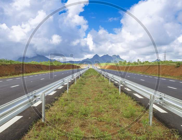 New highway against blue cloudy sky in the republic of  Mauritius