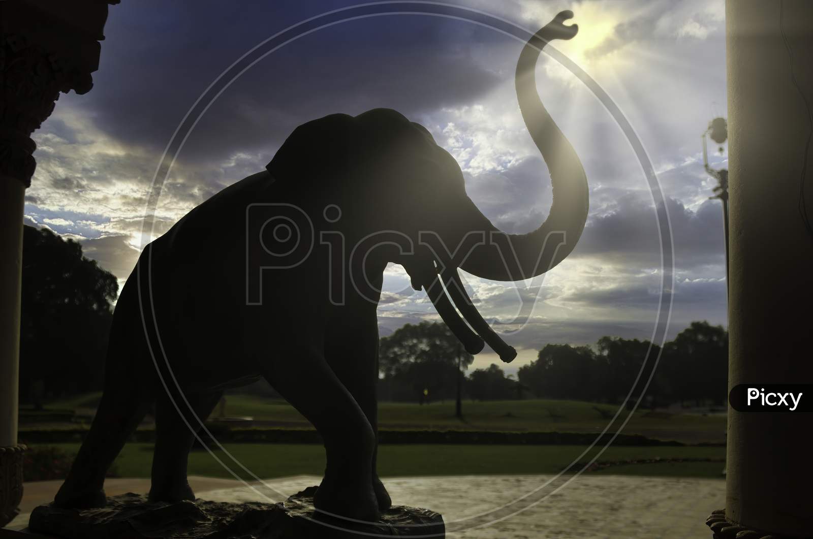 Vadodara, India - November 16, 2012: An Elephant Stone Monument Situated In The Lakshmi Vilas Palace In The State Of Gujarat Against Dramatic Sunset