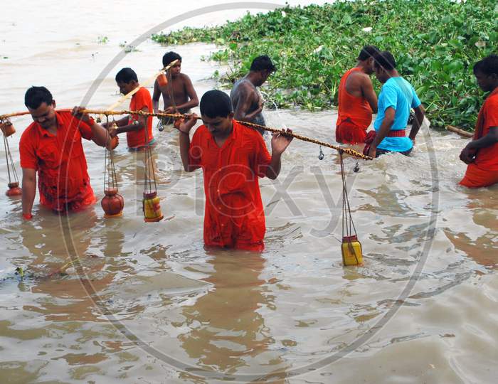 shiva devotees at seoraphuli west bengal taking holy water during holy shravan month
