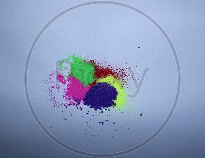 Colorful powder in the white background