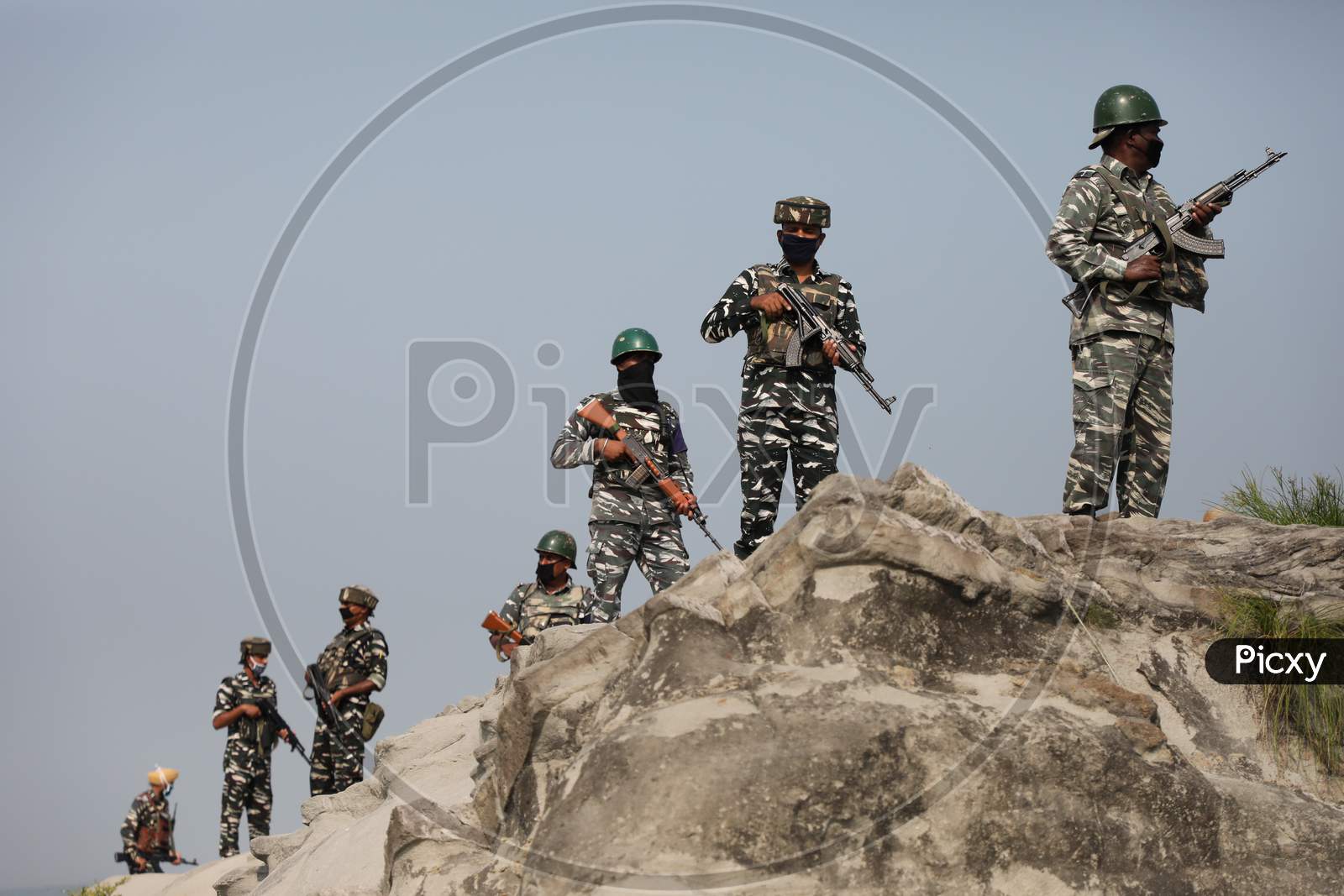Soldiers of the Central Reserve Police Force(CRPF) patrol the Jammu and Kashmir National Highway ahead of the upcoming Amarnath yatra in Jammu on July 14, 2020