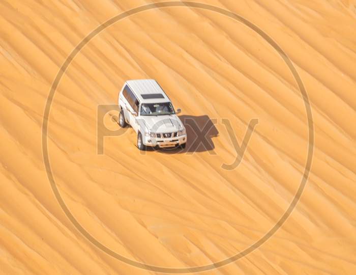 The Desert Patrol Vehicle Called Called The Fast Attack Vehicle Racing In Liwa Desert, Abu Dhabi,