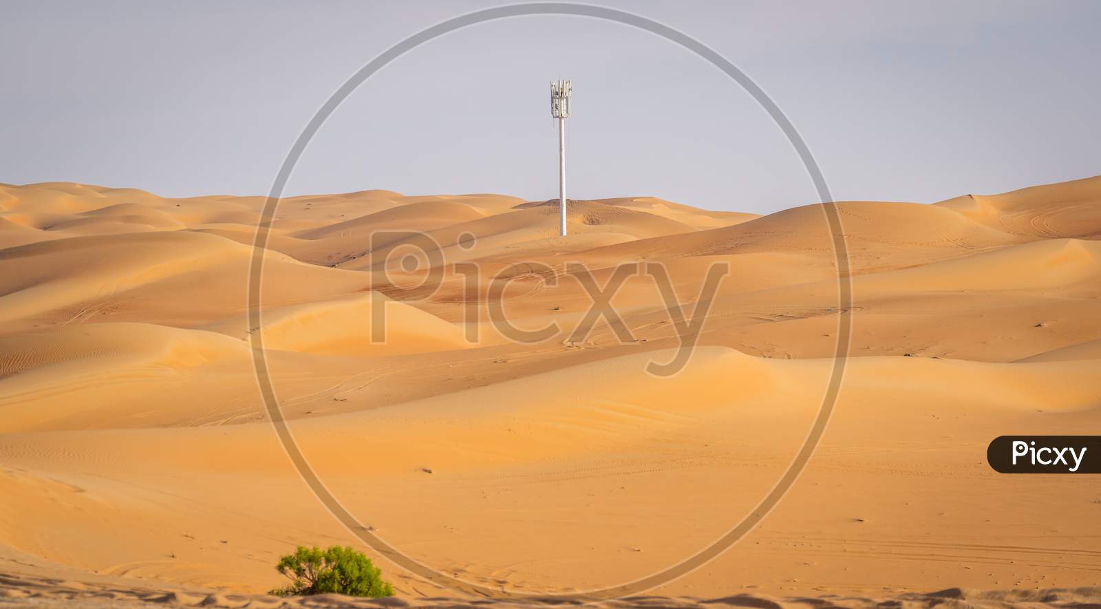 A Mobile Tower Alone In Sand Dunes In Liwa Desert Abu Dhabi