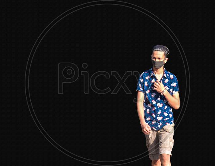 Hyderabad, Telangana, India. June-29-2020: Man Is Walking On The Road. Man With Protective Safety Mask On His Face, Isolated On White And Black Background