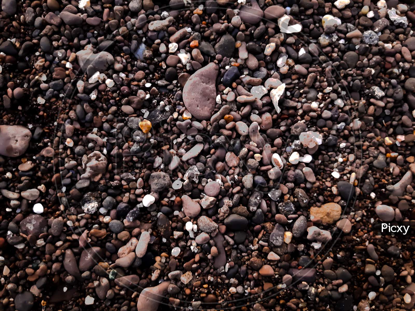 Stones at the sea shore worh different filter of colors
